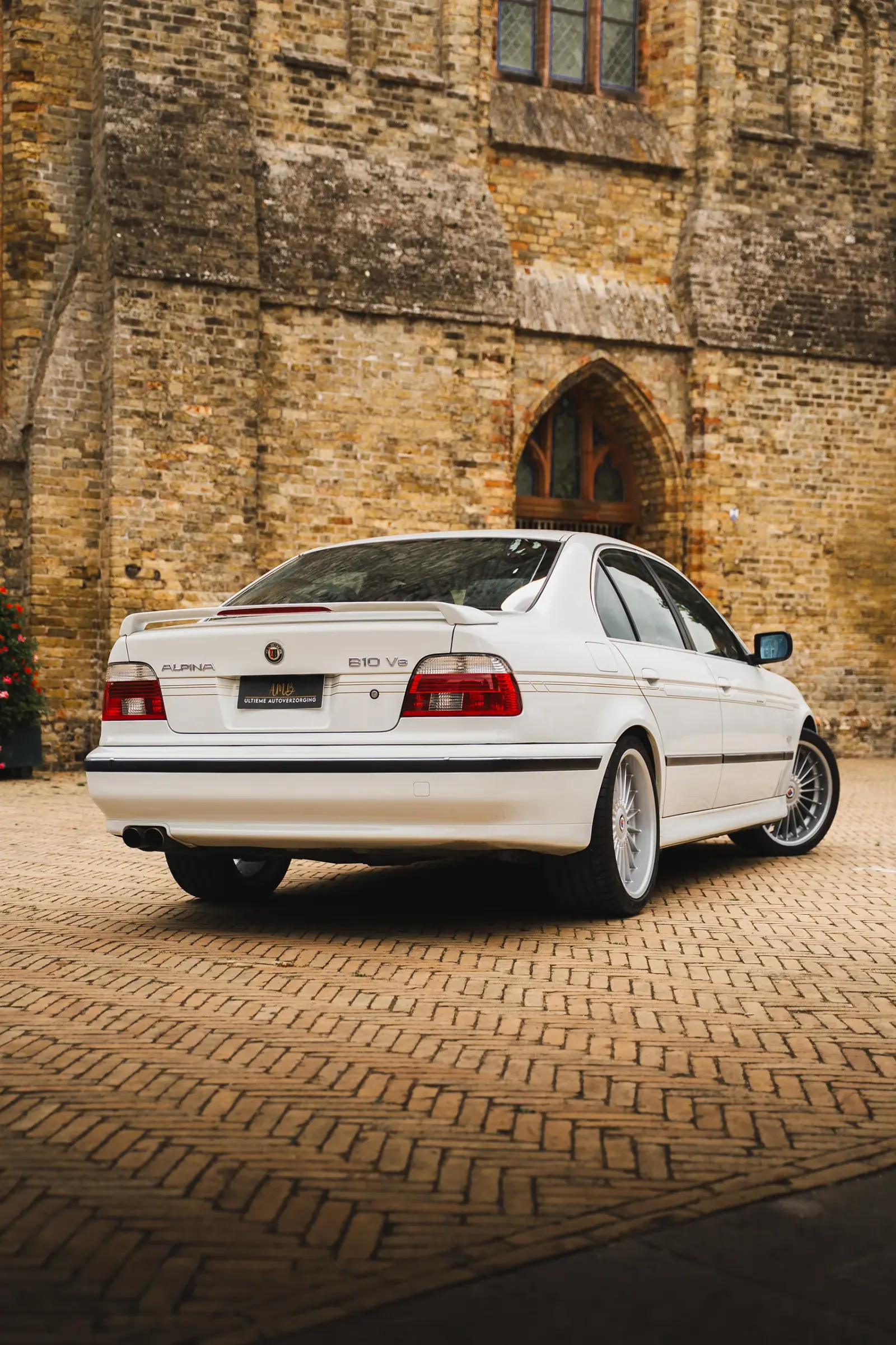 Alpina B10 V8 na volledige lakverzorging door AMB Detailing